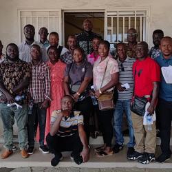 A group photo of the technicians at the PMU before deployment into the field