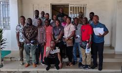A group photo of the technicians at the PMU before deployment into the field