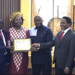  (IFAD) Country Representative Madam Pascaline Barankeba receiving a certificate of Appreciation from the government of Liberia