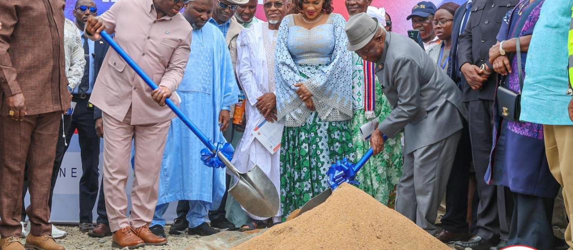 President Joseph Nyuma Boakai Sr. (right) and Julius Maada Bio (left) jointly break ground with ceremonial shovels at the 255-km Western Corridor road project in Liberia. Photo: Executive Mansion